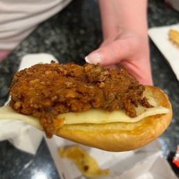 Thin overcooked spicy chicken sandwich Thin overcooked spicy chicken sandwich