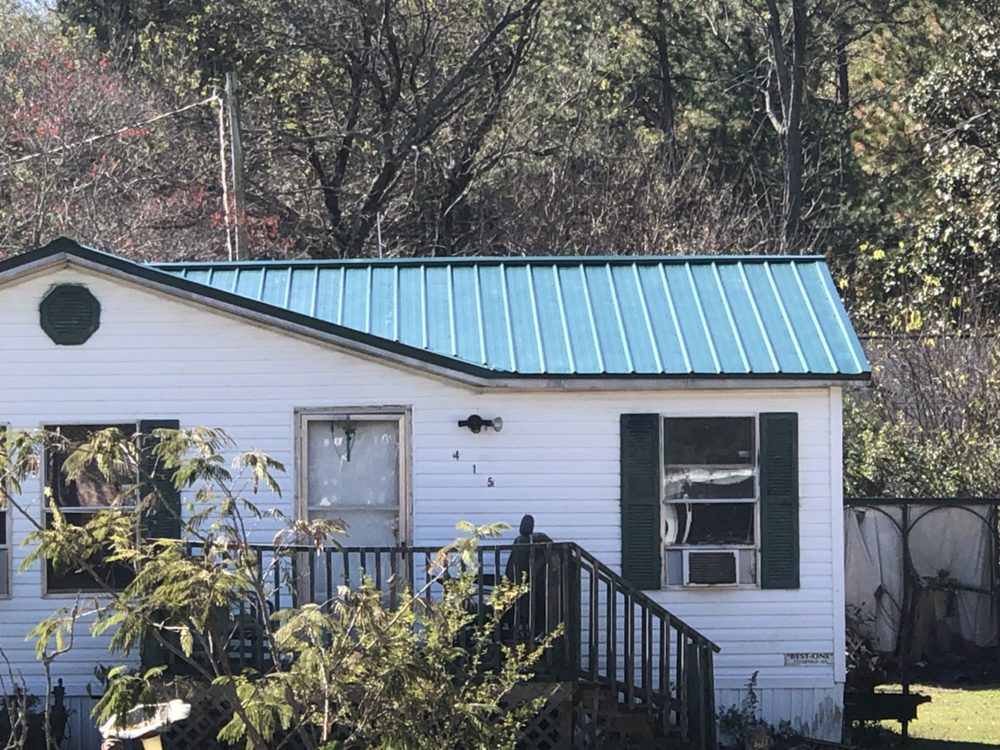 Slide of Butler Roofing