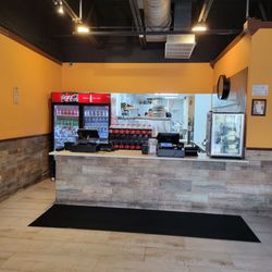 Gino's Pizza - Front counter and kitchen.