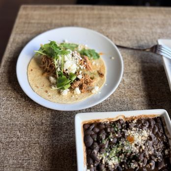 Flying Iguana - Carnitas, tacos, and black beans. - Latin American Near Me - Neptune Beach, Florida