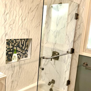 Luc's Construction - New bathtub, shower, glass, and tile - General Contractors Near Me