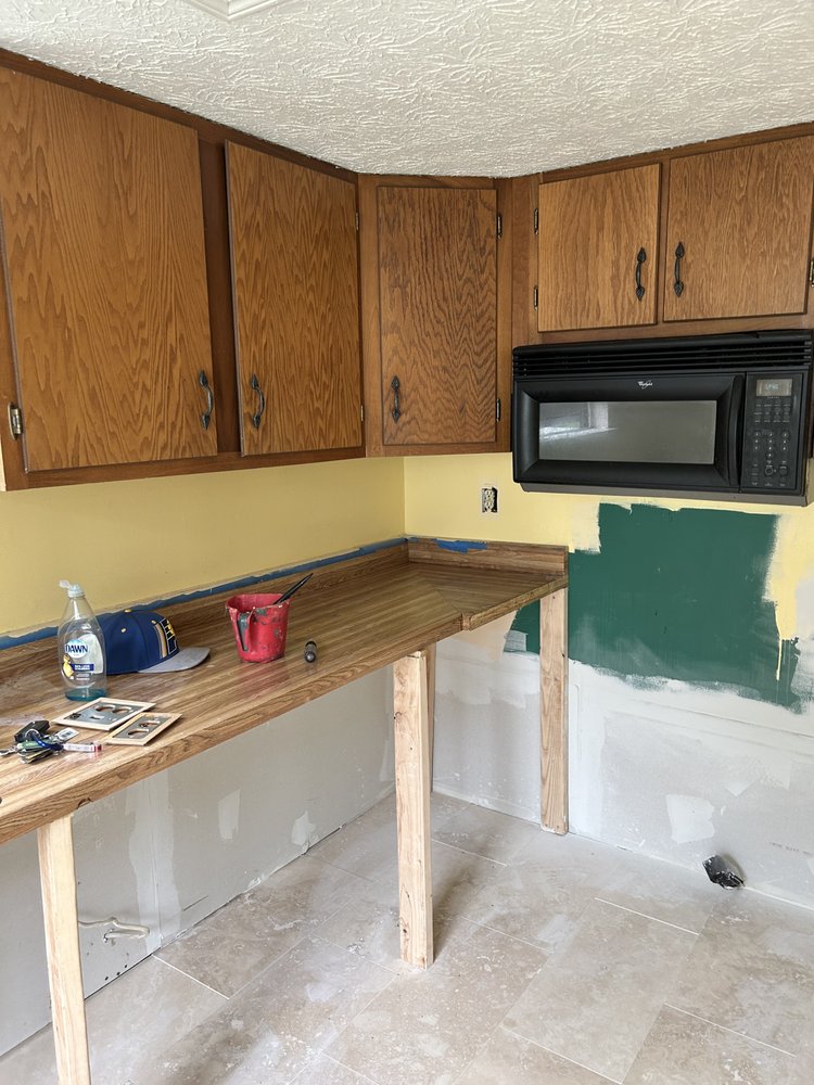 Slide of George’s Home Improvement