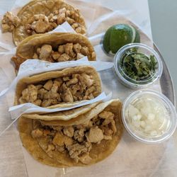 Taco Nest - Grilled chicken tacos - pair well with the simplistic onion and cilantro and lime