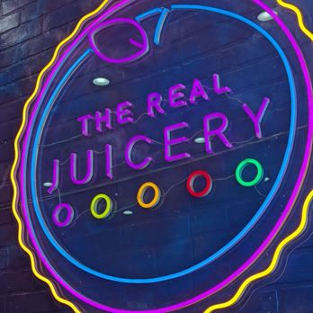 The Real Juicery - Cute neon sign at entrance - Juice Bars & Smoothies Near Me - Canoga Park, California