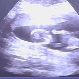 picture is our baby waving at us picture is our baby waving at us