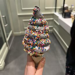 Taro and black sesame on top  Regular size  Sprinkles cone