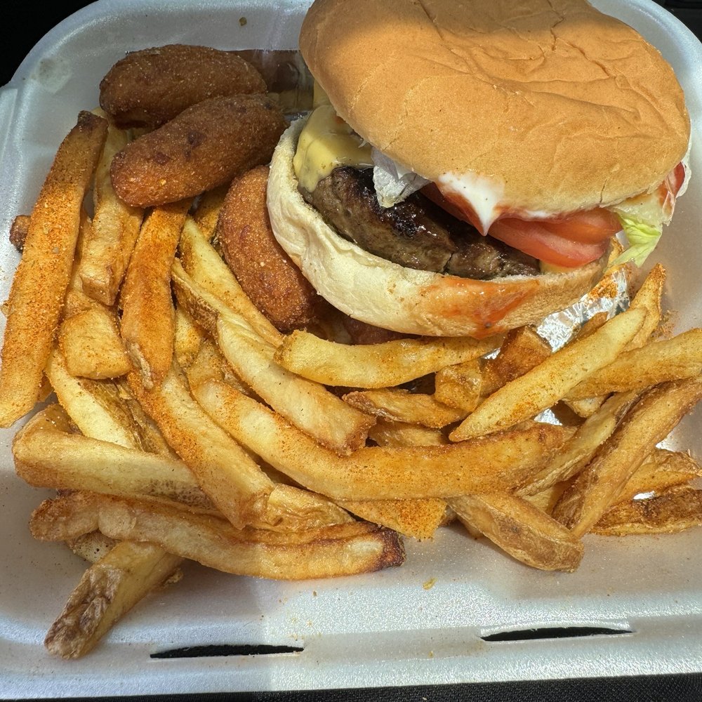 Bacon Cheeseburger tray with Cajun Fries and Hushpuppies..