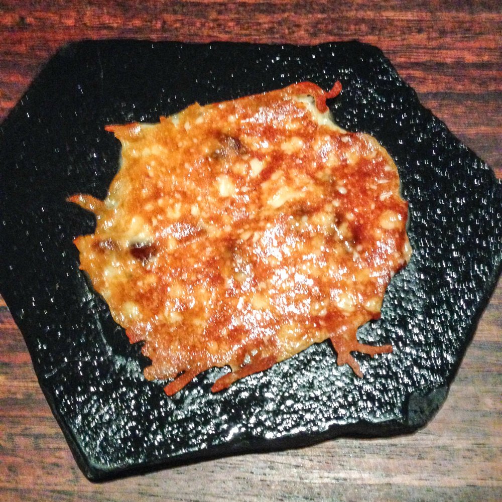 La Degustation Bohême Bourgeoise - 11th Course: blaťácké zlato, raisins. This is a take on the golden soft cheese. - Czech Near Me - Prague, Puerto Rico