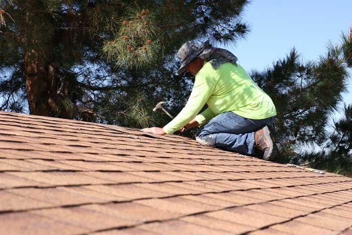 Slide of Rey My Roofer