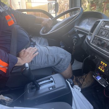 Carmel Towing - 95% of 8 mile flatbed tow with one hand draped lazily over inside of steering wheel. - Towing Near Me - Hollywood, California Carmel Towing - 95% of 8 mile flatbed tow with one hand draped lazily over inside of steering wheel. - Towing Near Me - Hollywood, California