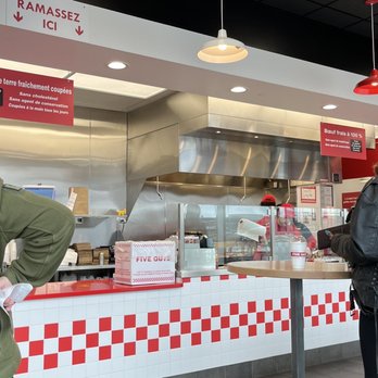 Five Guys - a man and a woman in a fast food restaurant - American Near Me - Laval, Quebec
