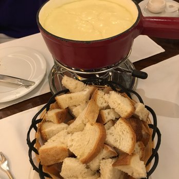 Restaurant Walliser Kanne - Swiss Fondue served with bread. - Swiss Food Near Me - Basel, BS