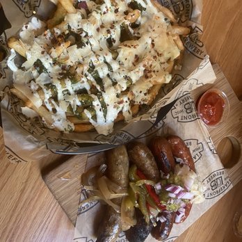 Lakefront Brewery - Sausage flight and loaded fries - Breweries Near Me - Milwaukee, Wisconsin Lakefront Brewery - Sausage flight and loaded fries - Breweries Near Me - Milwaukee, Wisconsin
