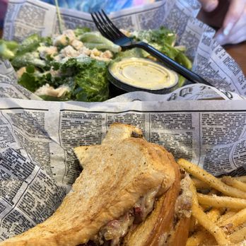Ella's Kitchen + Wine Bar - Chicken Ceasure Salaid and a Rubin with fries. - Wine Bars Near Me - Canal Winchester, Ohio