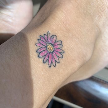 Ascension Tattoo - Pink daisy on right ankle. - Tattoo Near Me - Sedona, Arizona Ascension Tattoo - Pink daisy on right ankle. - Tattoo Near Me - Sedona, Arizona