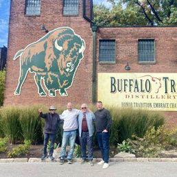 Exterior outside entrance of Bourbon Excursions - Rafiq, Seth, me and Mark outside Buff Trace. - Louisville, Kentucky Exterior outside entrance of Bourbon Excursions - Rafiq, Seth, me and Mark outside Buff Trace. - Louisville, Kentucky