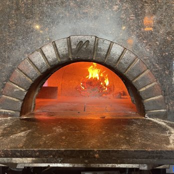 Coalfire Pizza - fire coming out of the oven - Pizza Near Me - Chicago, Illinois Coalfire Pizza - fire coming out of the oven - Pizza Near Me - Chicago, Illinois