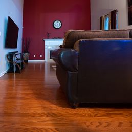 a living room with red walls