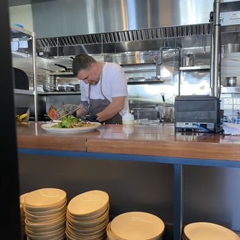 Bar C'est L'eau - Chef Joe working magic - French Near Me - Tumwater, Washington