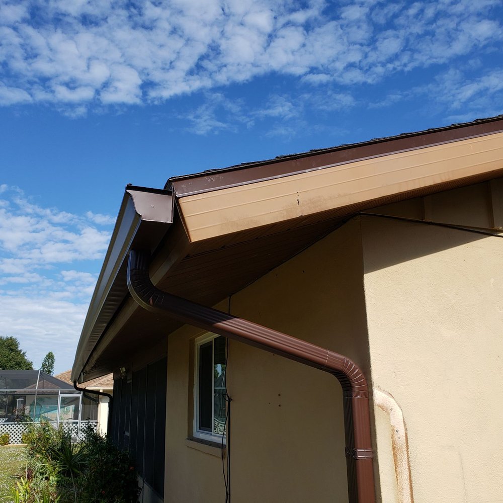 Zeus Gutter Protection - A side view of the downspout - Gutter Services Near Me - Port Charlotte, Florida Zeus Gutter Protection - A side view of the downspout - Gutter Services Near Me - Port Charlotte, Florida