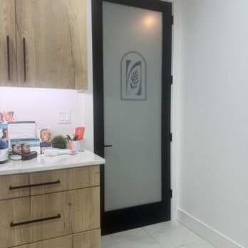 Nōvuu Medspa - Beautiful glass door, one of the treatments room - Weight Loss Centers Near Me - Pikesville, Maryland