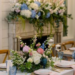 Town and Country Floral Gallery - Head table florals at French Farmhouse. Wedding flowers provided by Town and Country Floral in Granbury Tx