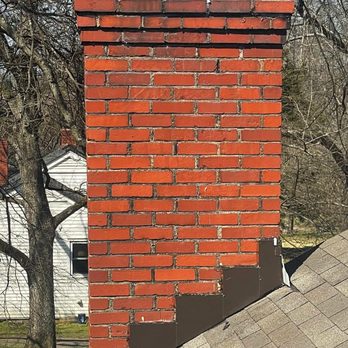 Birmingham Roofs - Clean, step flashing along our customers chimney - Roofing Near Me - Birmingham, Alabama
