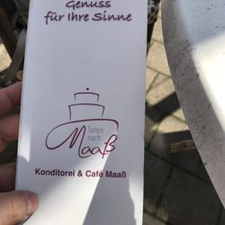 Konditerei und Cafe Maass - Menu: It says, "Enjoyment for your senses"