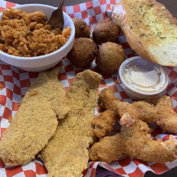 Louisiana Fish House - 3 shrimp and 2 catfish hush puppies n Jambalaya rice. - Cajun/Creole Near Me - Houston, Texas