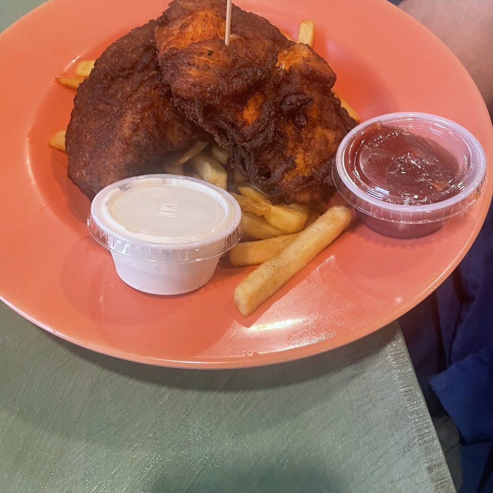 Sudi's Caribbean Bar & Grille - Fish and chips. Portion was awesome. But no taste! The vinegar made all the difference. - New American Near Me - St. Thomas, Virgin Islands Sudi's Caribbean Bar & Grille - Fish and chips. Portion was awesome. But no taste! The vinegar made all the difference. - New American Near Me - St. Thomas, Virgin Islands