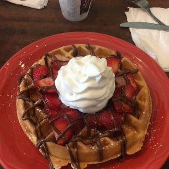 Bogart's Cafe - Belgian waffles with Nutella and strawberries - Breakfast & Brunch Near Me - Honolulu, Hawaii Bogart's Cafe - Belgian waffles with Nutella and strawberries - Breakfast & Brunch Near Me - Honolulu, Hawaii