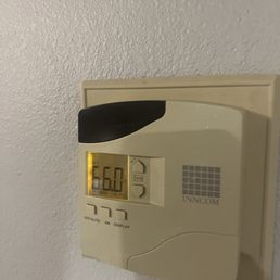 Outdated heater that took forever to kick on and didn't match the room.