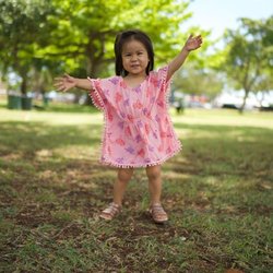 Lani Lau - ~Shout out to Our UPS Driver Brandon~His cute daughter Bella wearing Coral Pom Poncho~ Photo credit to MamaChristine@RabeSquaredPhotography