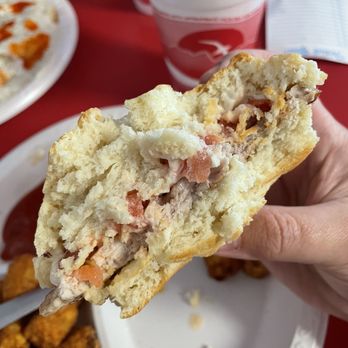 Debbie's Snack Bar - Tenderloin biscuit cross section - Hot Dogs Near Me - Hamptonville, North Carolina Debbie's Snack Bar - Tenderloin biscuit cross section - Hot Dogs Near Me - Hamptonville, North Carolina