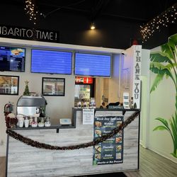 Jibarito Time Chicago Style Plantain Sandwiches - Interior of order station and kitchen entrance, zoom in to read menu (Dec 2024)