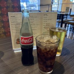 Loved the ice cold bottle of Coca Cola and great beer on tap Loved the ice cold bottle of Coca Cola and great beer on tap