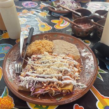 Mary's - Red chicken enchiladas with rice and beans - Mexican Near Me - Sayulita, NAY Mary's - Red chicken enchiladas with rice and beans - Mexican Near Me - Sayulita, NAY