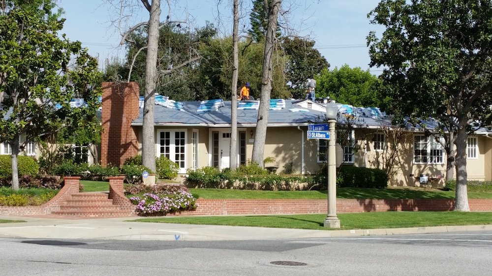 Slide of Ace Roofing Company