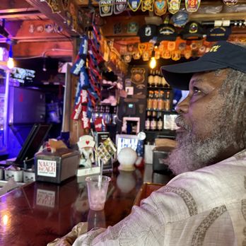 Heroes Bar & Liberty Lounge - Brother enjoying his Hurricane - Sports Bars Near Me - Key West, Florida Heroes Bar & Liberty Lounge - Brother enjoying his Hurricane - Sports Bars Near Me - Key West, Florida