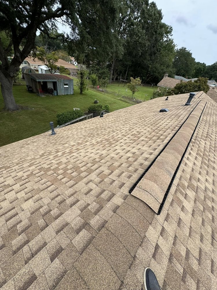 Slide of Woody's Roofing