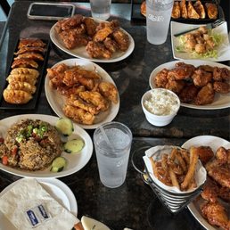 Whole table of all the food we ordered! Minus the minor cutoff of the pork buns.