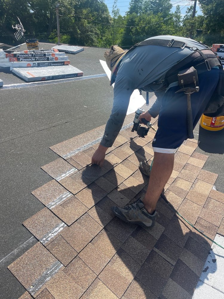 Slide of Arch Roofing & Repair