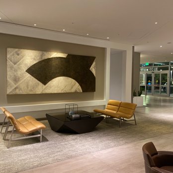 AC Hotel Irvine - Like the modern "esque".  Style of this area in the large & spacious lobby.    I like it ..... Maybe ..... hmmmm ..... maybe not. - Hotels Near Me - Irvine, California