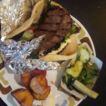 Dancing Avocado Kitchen - Da street meat wrap,side of cuke salad - Mexican Near Me - Daytona Beach, Florida