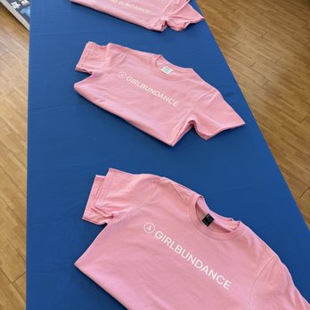 Fully Promoted - Custom screen-printed pink Girlbundance T-shirts for fitness classes, dance teams, wellness events, and branded apparel. - Customized Merchandise Near Me - Oceanside, California Fully Promoted - Custom screen-printed pink Girlbundance T-shirts for fitness classes, dance teams, wellness events, and branded apparel. - Customized Merchandise Near Me - Oceanside, California
