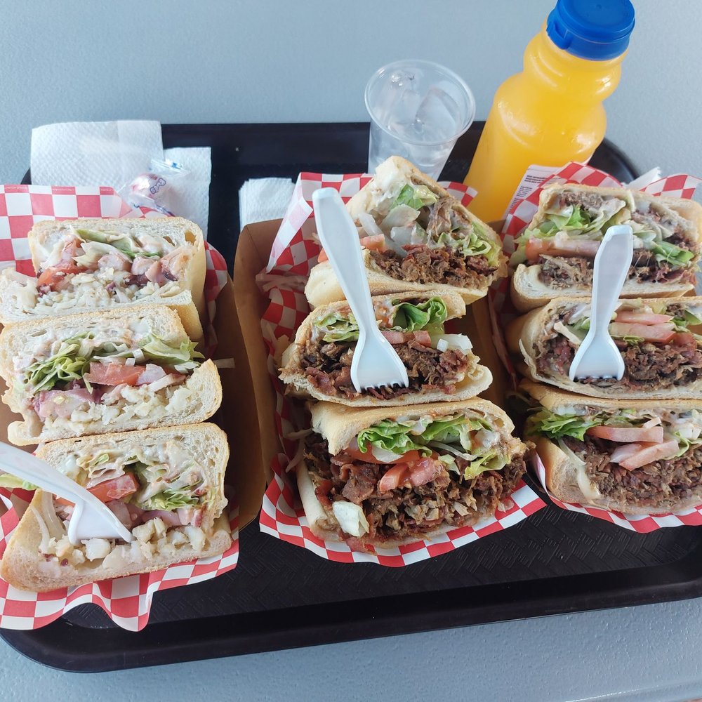 Punto Once - I'm the best critic of food since I am a authentic puertorican food chef !! The best tripletas ! - Caribbean Near Me - Playa, Puerto Rico