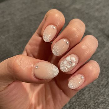 Top City Nails - Glitter/Nude Acrylic Baby Almond Nails w/ jewels and a flower. - Nail Salons Near Me - Riverside, California