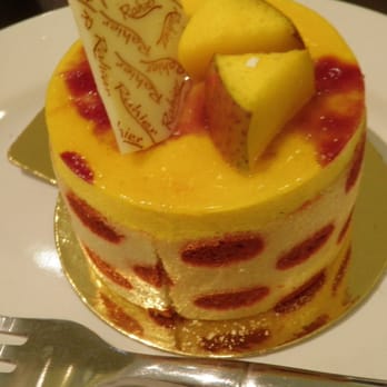Rahier Patisserie - Rimbaud - Mango Mousse, ginger cream, financier sponge cake ($5) - Bakeries Near Me - Toronto, Ontario Rahier Patisserie - Rimbaud - Mango Mousse, ginger cream, financier sponge cake ($5) - Bakeries Near Me - Toronto, Ontario