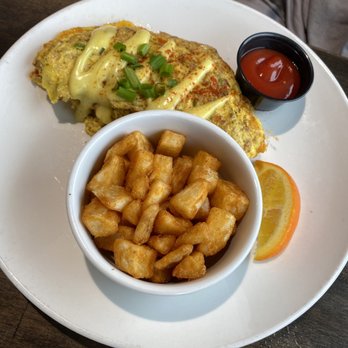 Brick & Spoon - Biloxi - Cajun omelet I think - Breakfast & Brunch Near Me - Biloxi, Mississippi Brick & Spoon - Biloxi - Cajun omelet I think - Breakfast & Brunch Near Me - Biloxi, Mississippi