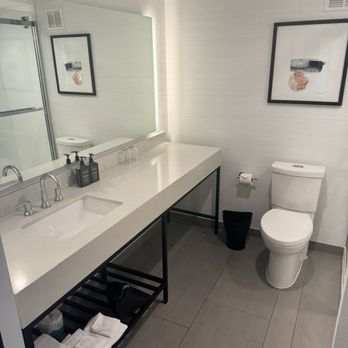 Sheraton Reston Hotel - beautiful updated bathroom with rain shower head - Hotels Near Me - Reston, Virginia